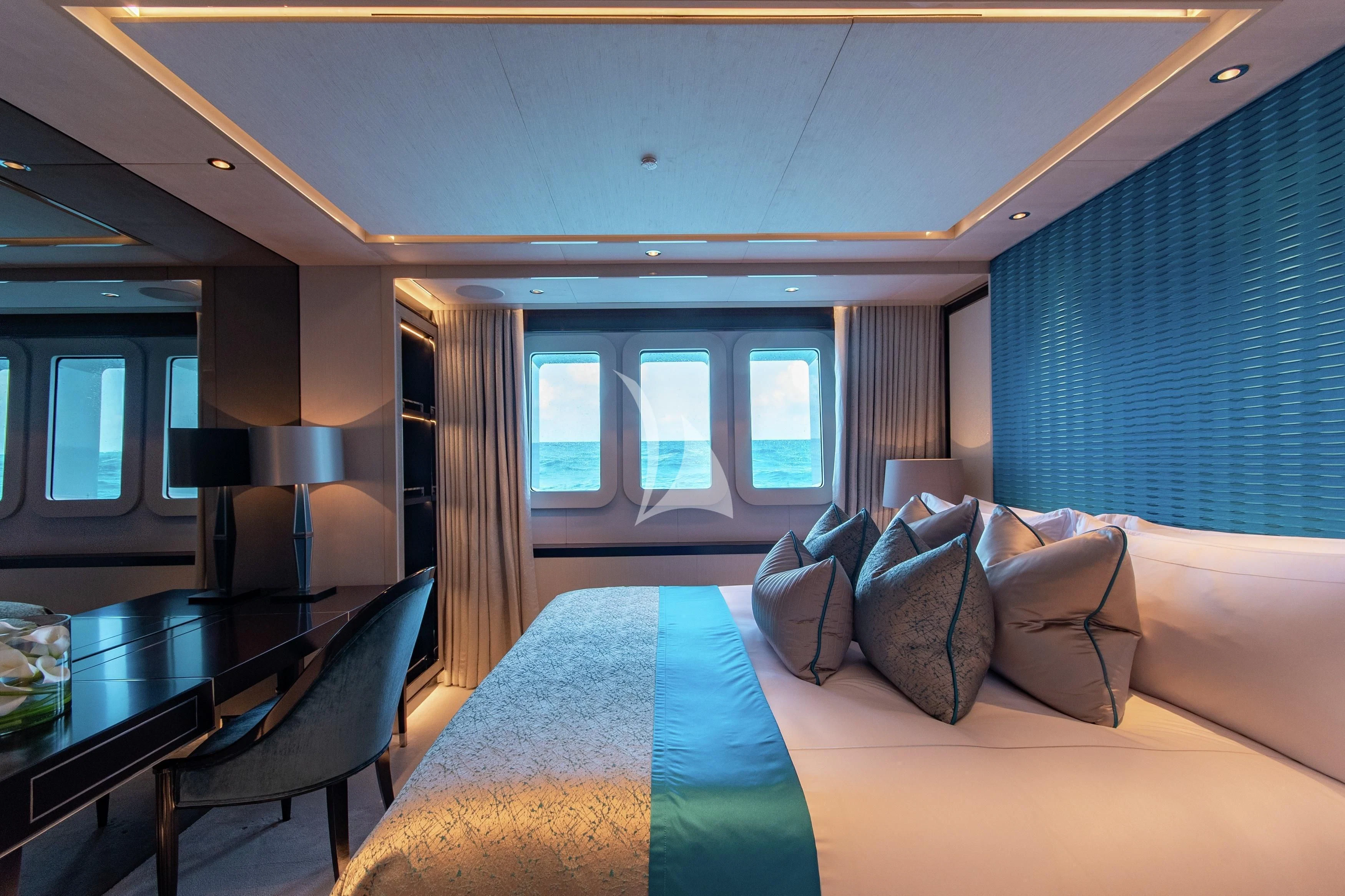 a hotel room with a bed and a desk aboard NORTH STAR Yacht for Sale