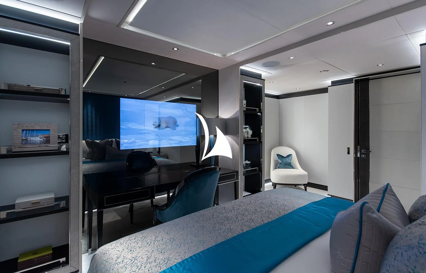 a room with a bed and a desk aboard NORTH STAR Yacht for Sale