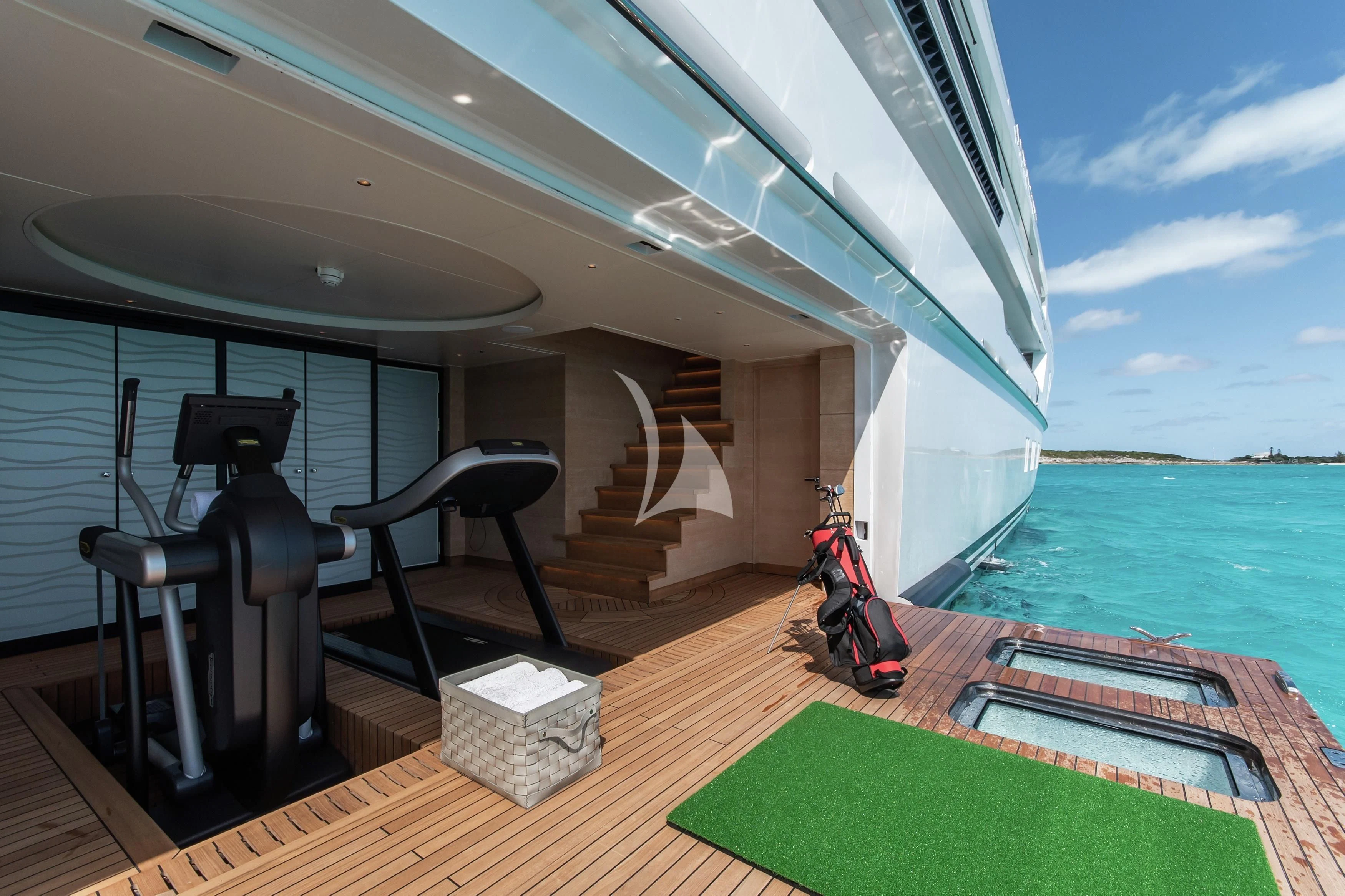 a room with a slide and a pool aboard NORTH STAR Yacht for Sale