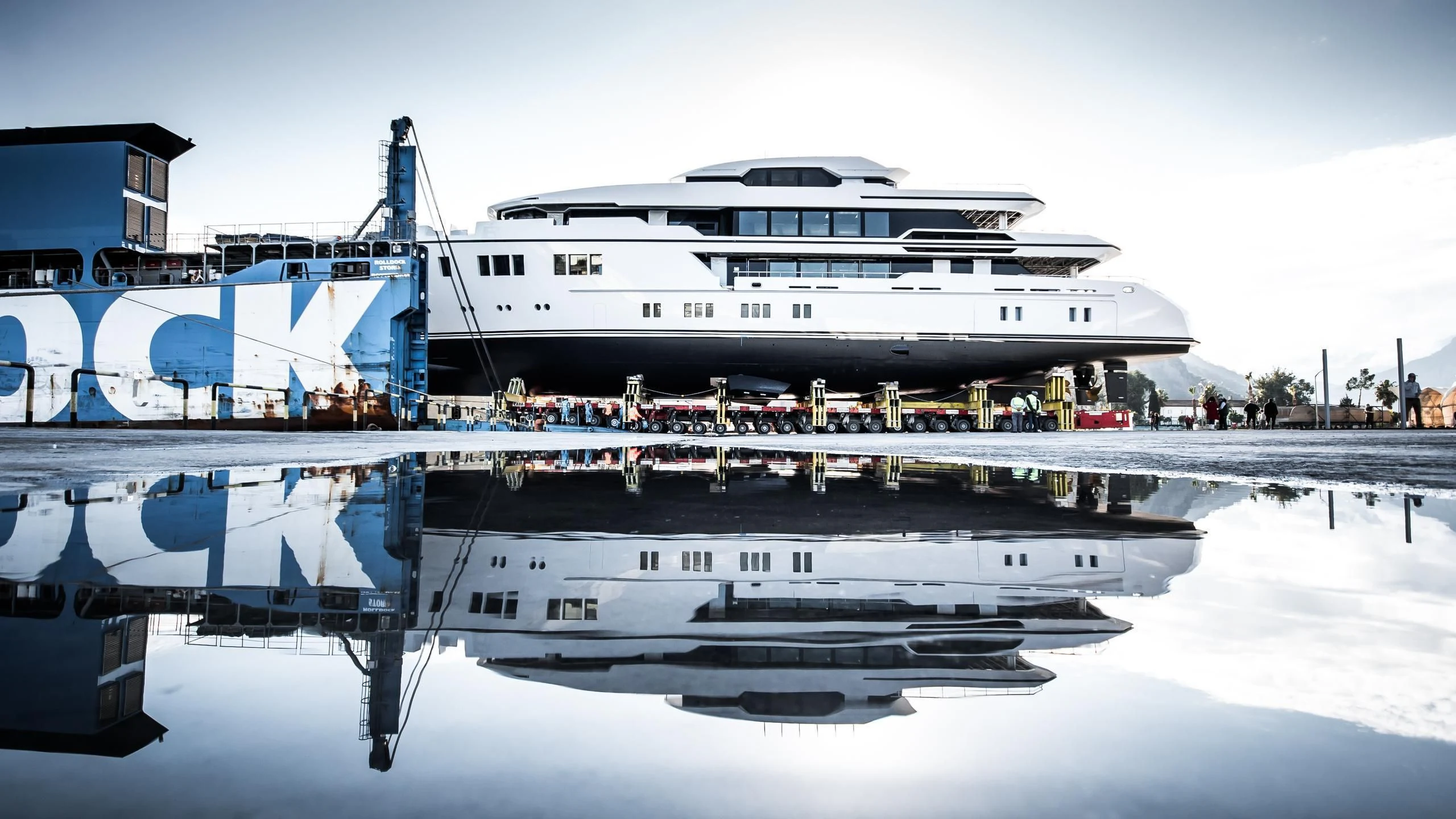 a large white boat docked at a pier aboard NORTH STAR Yacht for Sale