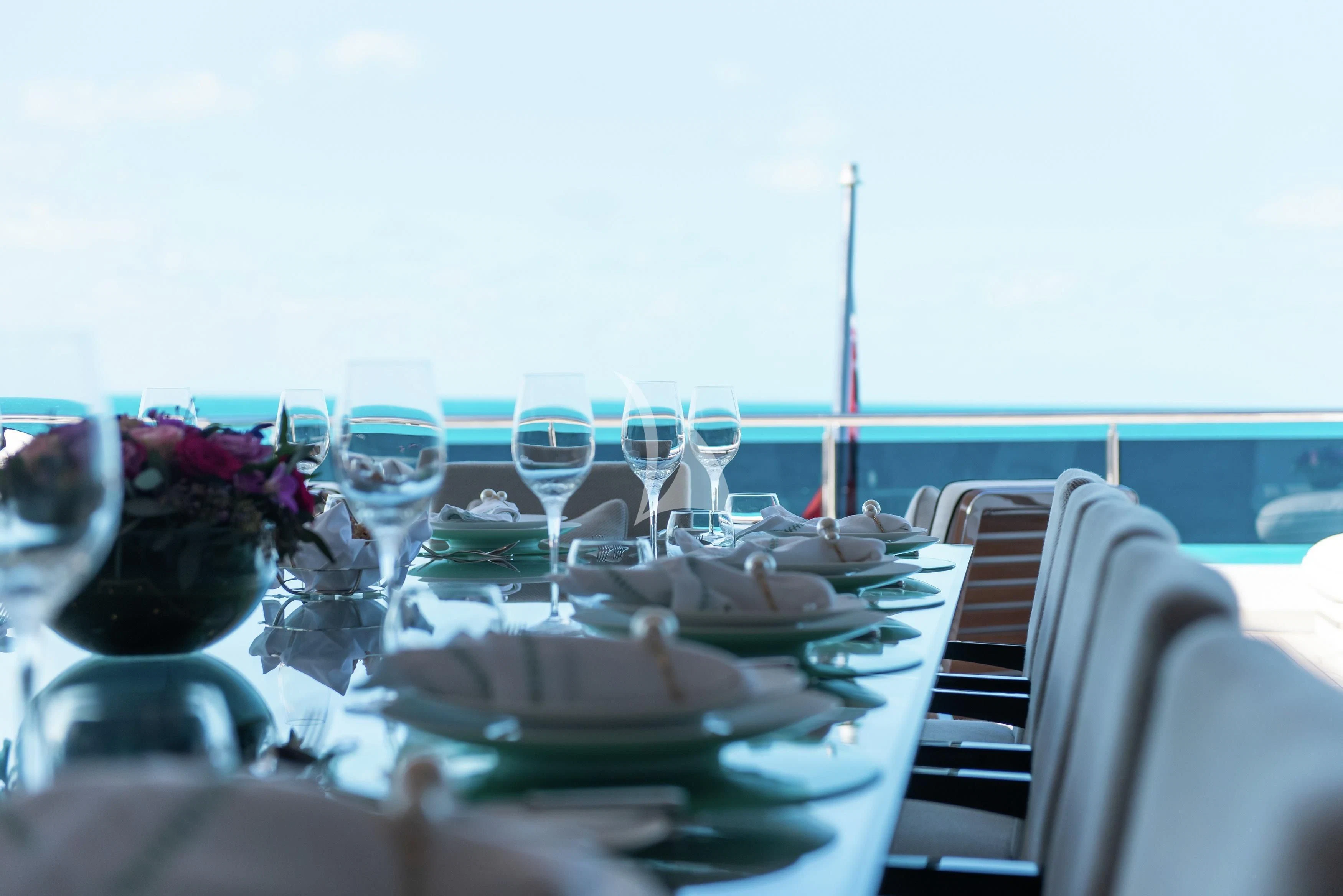 a table set with glasses and food aboard NORTH STAR Yacht for Sale