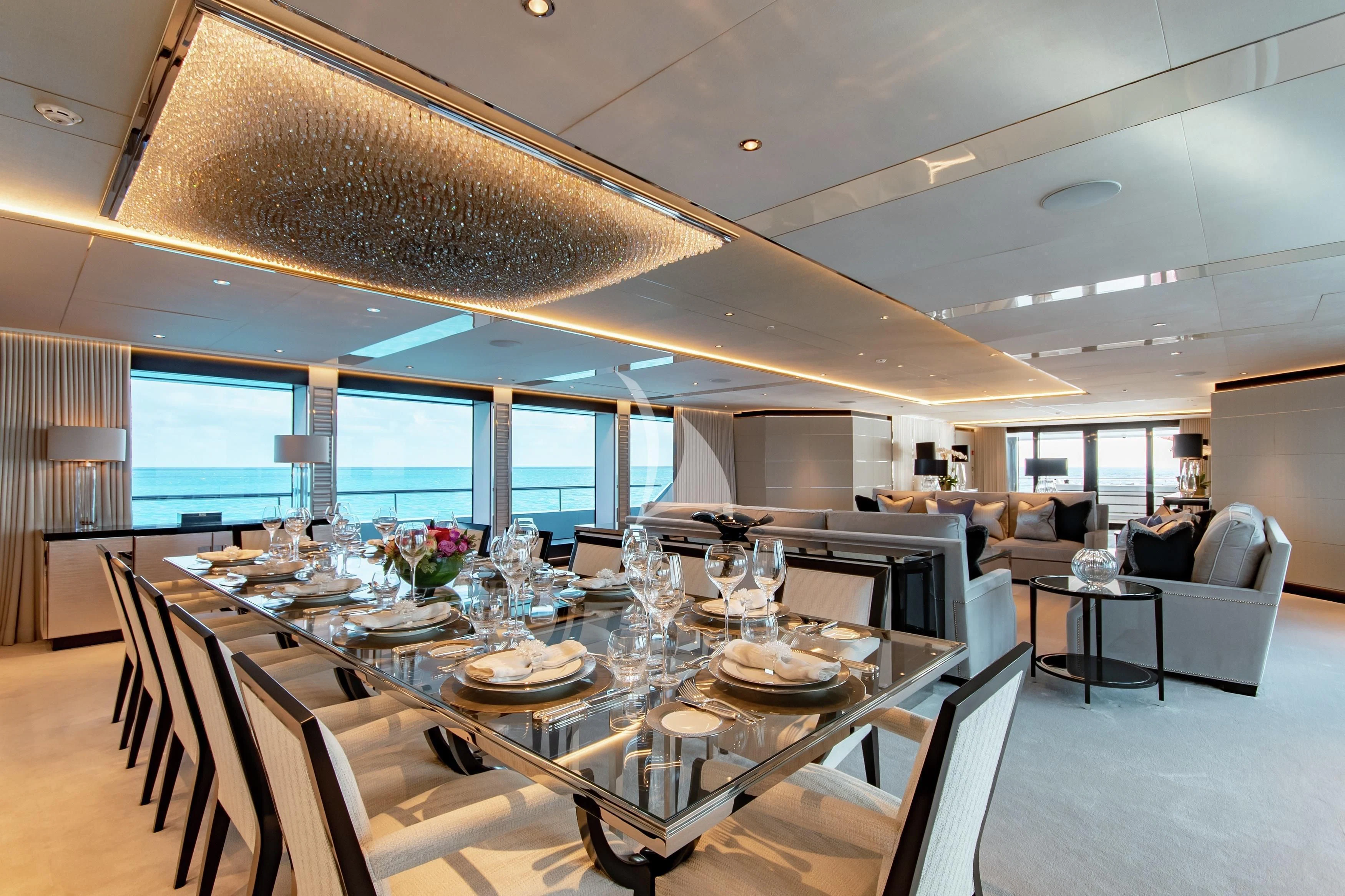 a large dining room with a large table and chairs aboard NORTH STAR Yacht for Sale