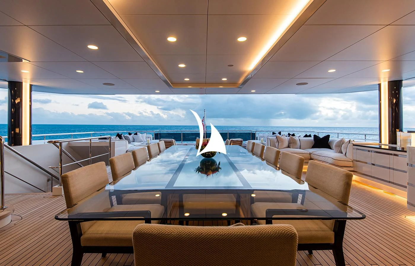 a large room with chairs and a large table with a large window aboard NORTH STAR Yacht for Sale