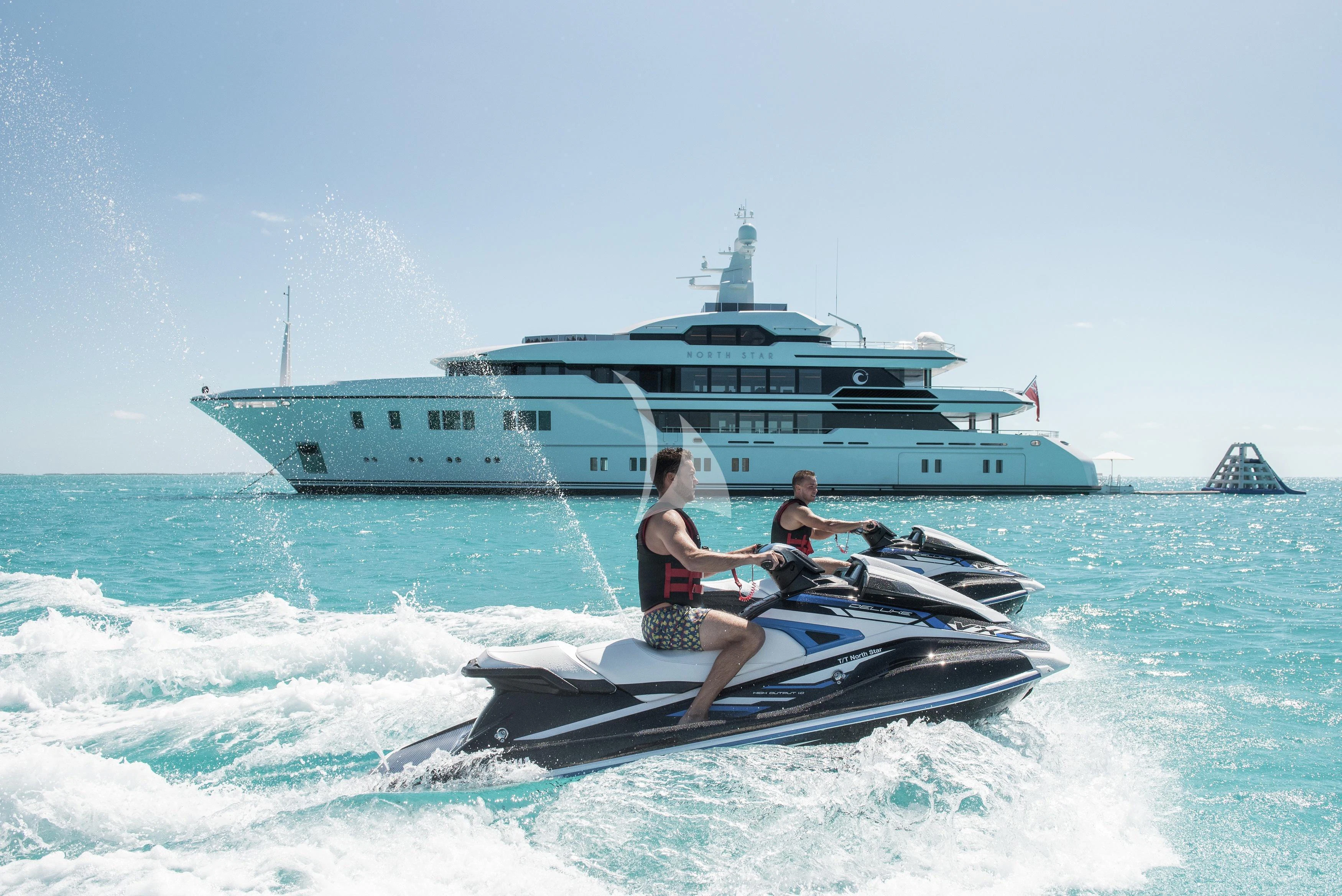 a group of people on a boat in the water aboard NORTH STAR Yacht for Sale