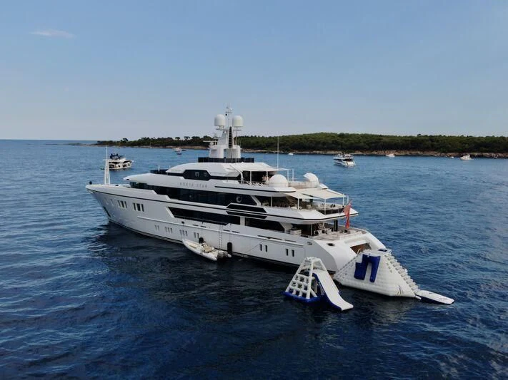 a large white boat on the water aboard NORTH STAR Yacht for Sale