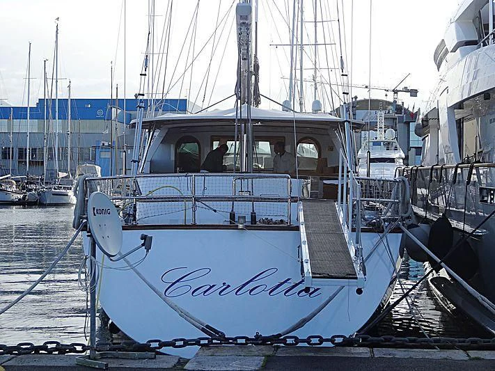 a boat in a harbor aboard CARLOTTA Yacht for Sale