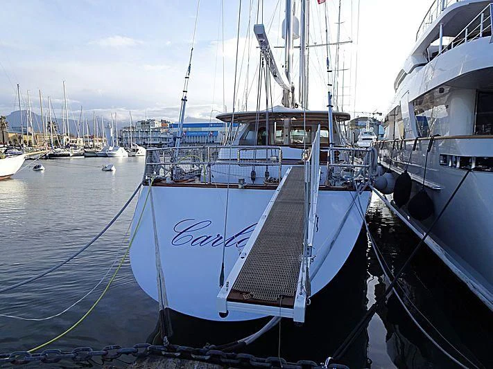 a group of boats are parked in a harbor aboard CARLOTTA Yacht for Sale