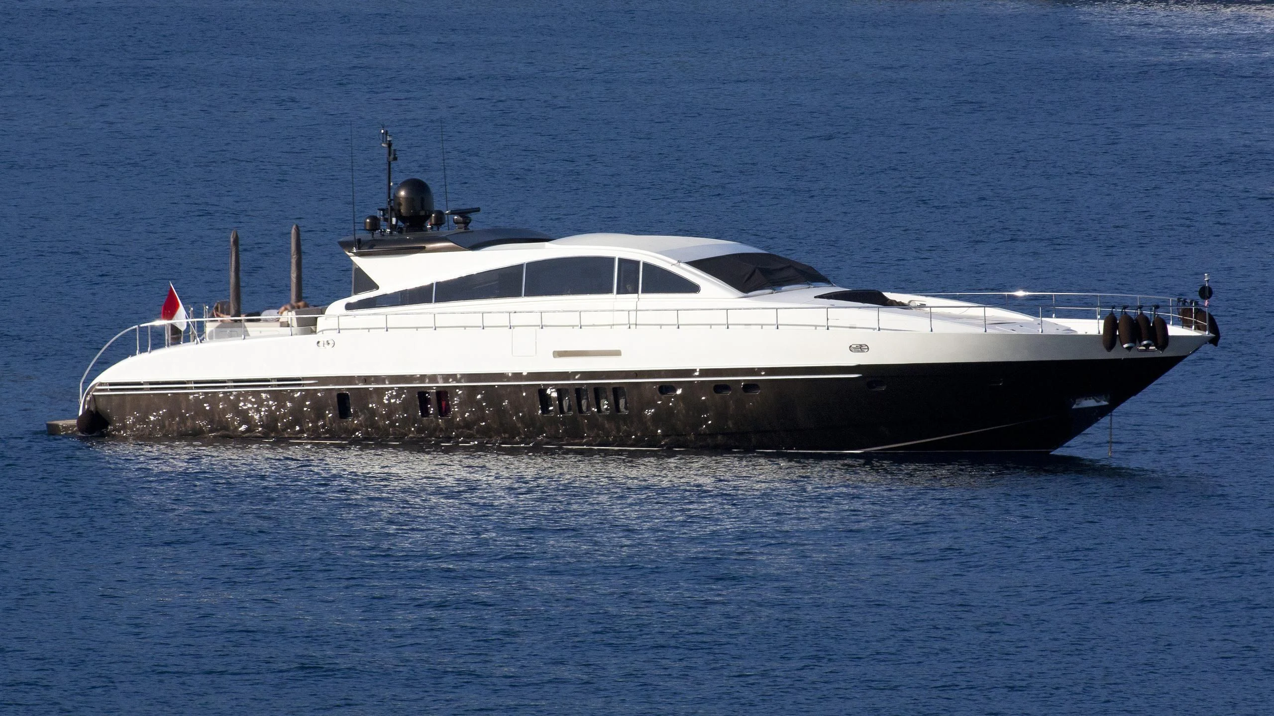 a white yacht in the water aboard BLOOMS Yacht for Sale