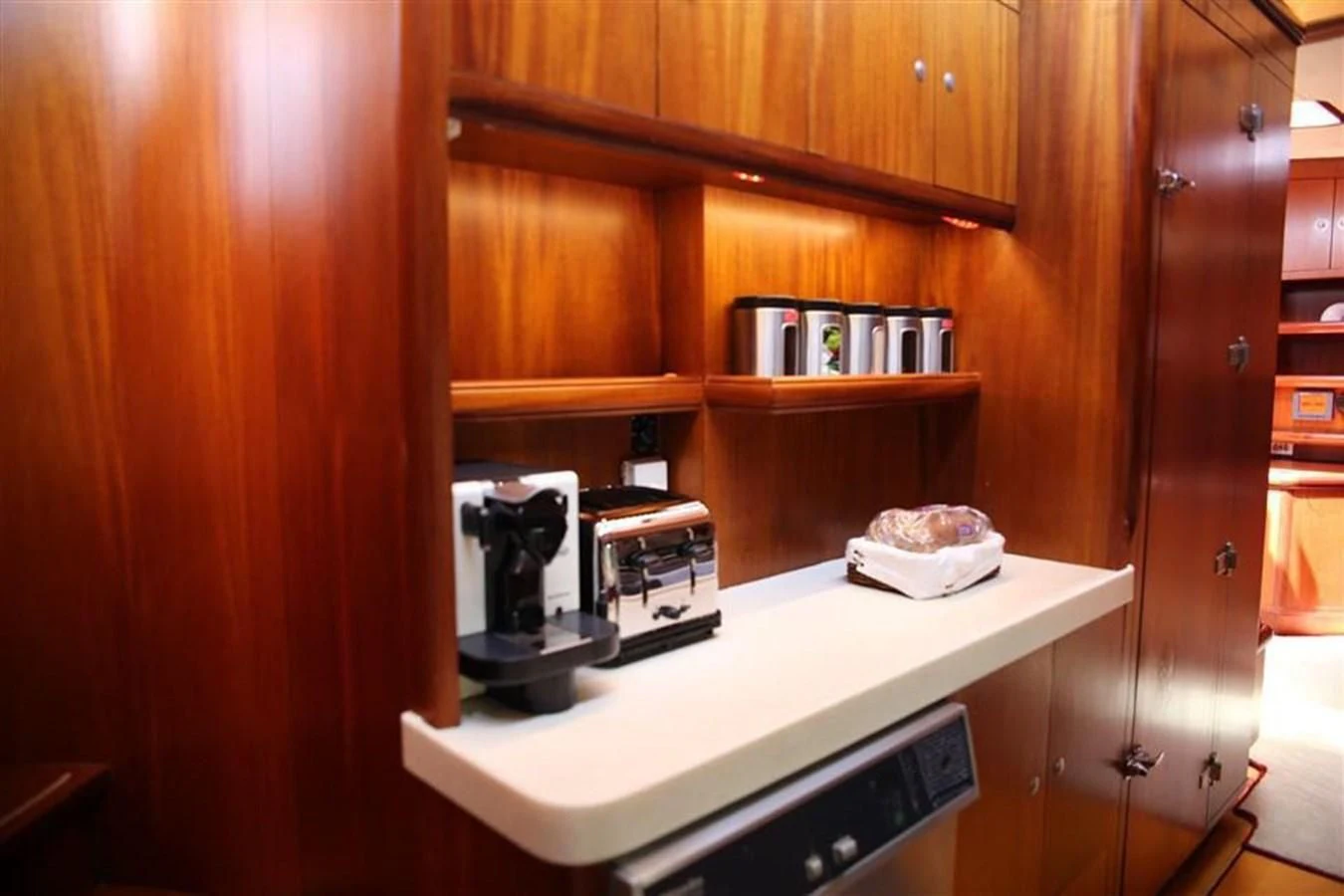 a coffee machine on a counter aboard WHIRLWIND Yacht for Sale