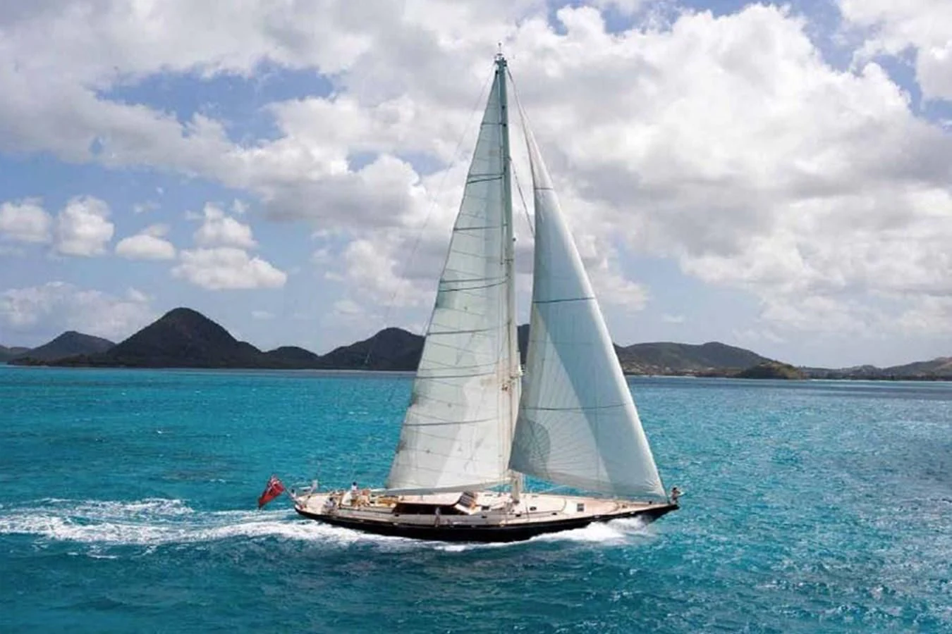 a sailboat on the water aboard WHIRLWIND Yacht for Sale