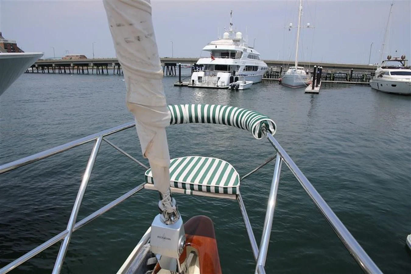 a boat with a sail on the water aboard WHIRLWIND Yacht for Sale