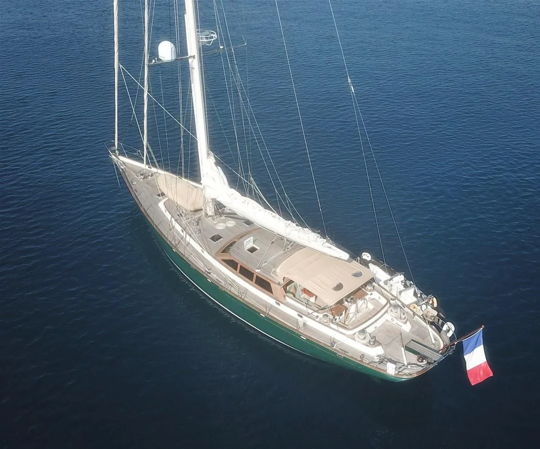 a large white boat in the water aboard WHIRLWIND Yacht for Sale