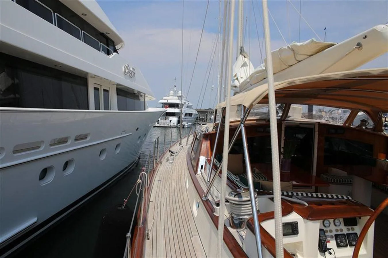 a group of boats on a dock aboard WHIRLWIND Yacht for Sale