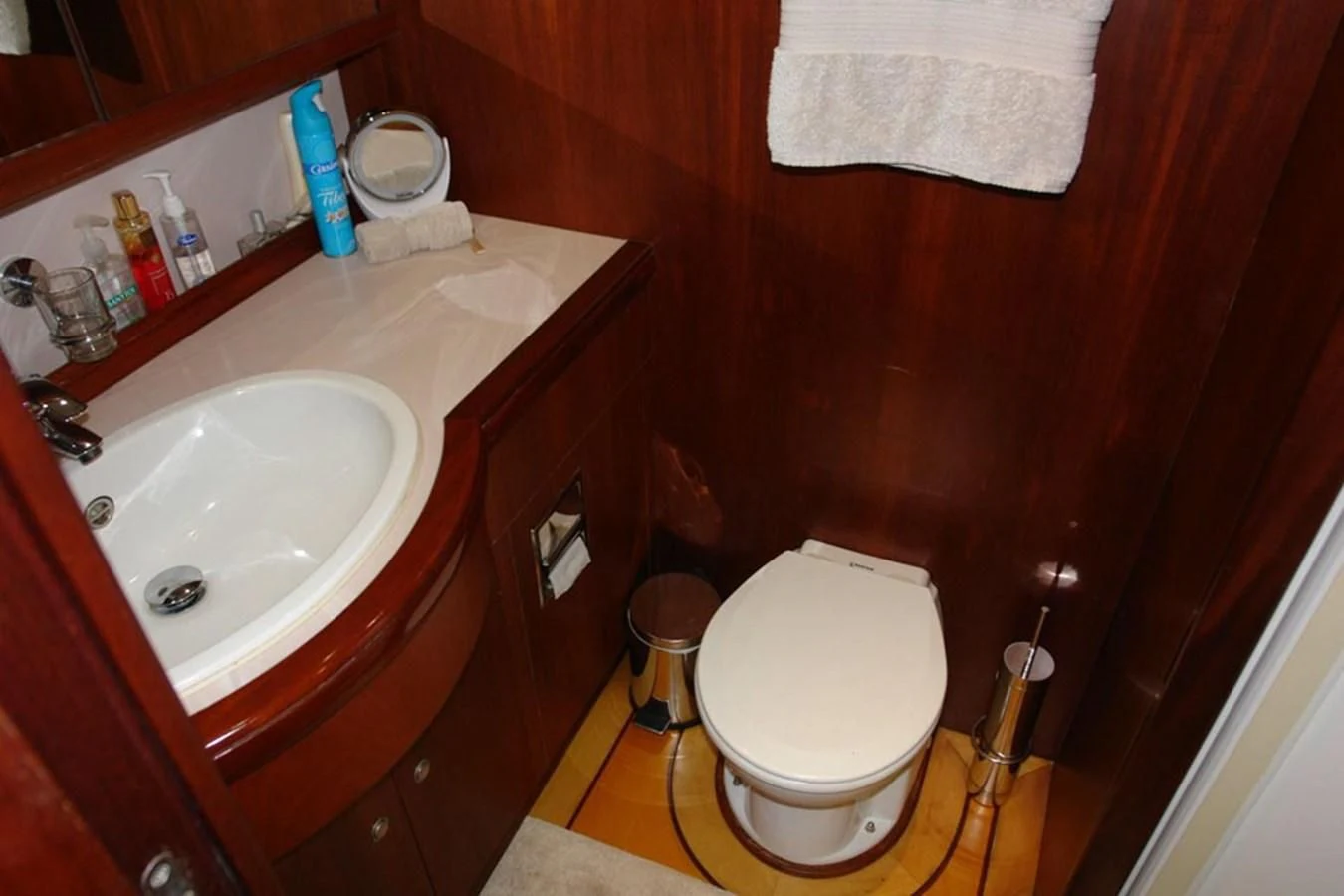 a bathroom with a sink and toilet aboard WHIRLWIND Yacht for Sale
