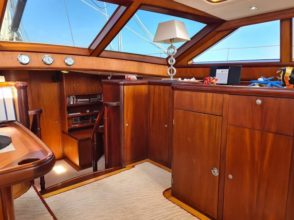 a room with a desk and a lamp aboard WHIRLWIND Yacht for Sale