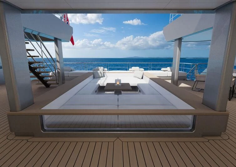 a deck with a view of the ocean and a deck aboard SILVERCAT Yacht for Sale