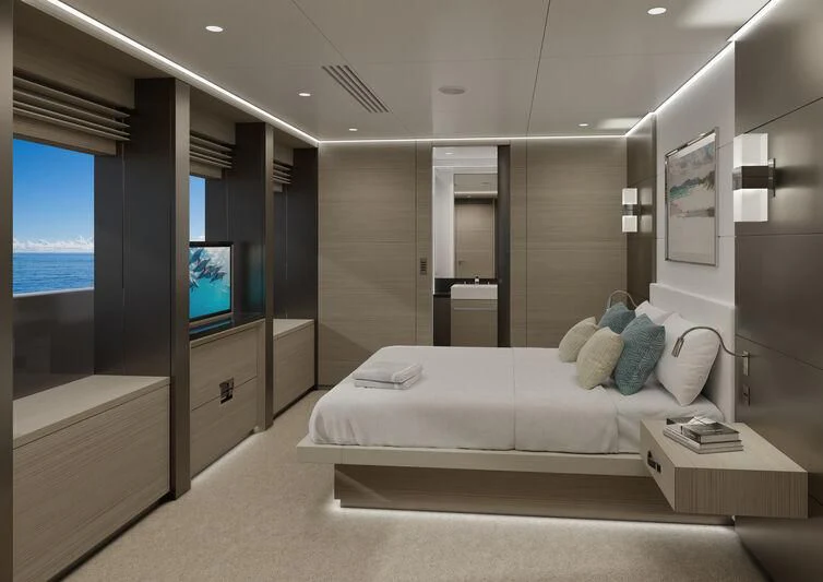 a bedroom with a large mirror aboard SILVERCAT Yacht for Sale