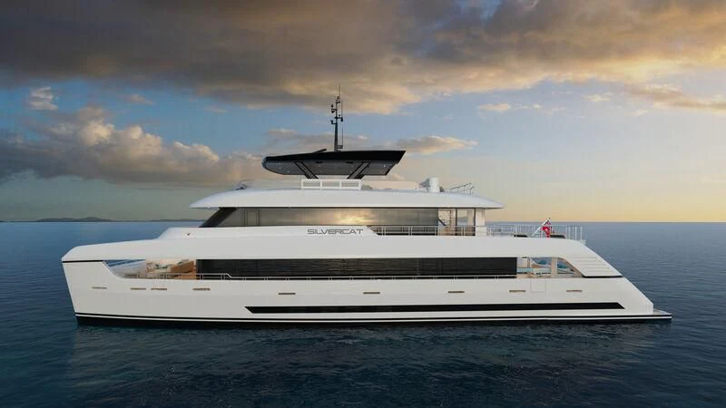 a white yacht in the water aboard SILVERCAT Yacht for Sale