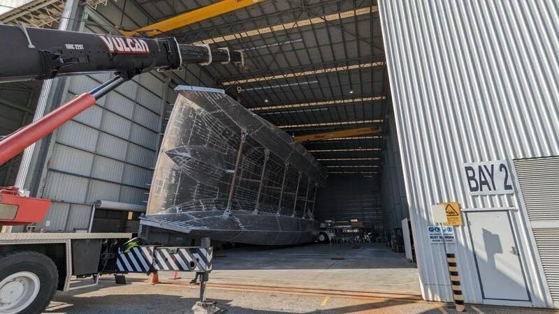 a large metal object in a warehouse aboard SILVERCAT Yacht for Sale