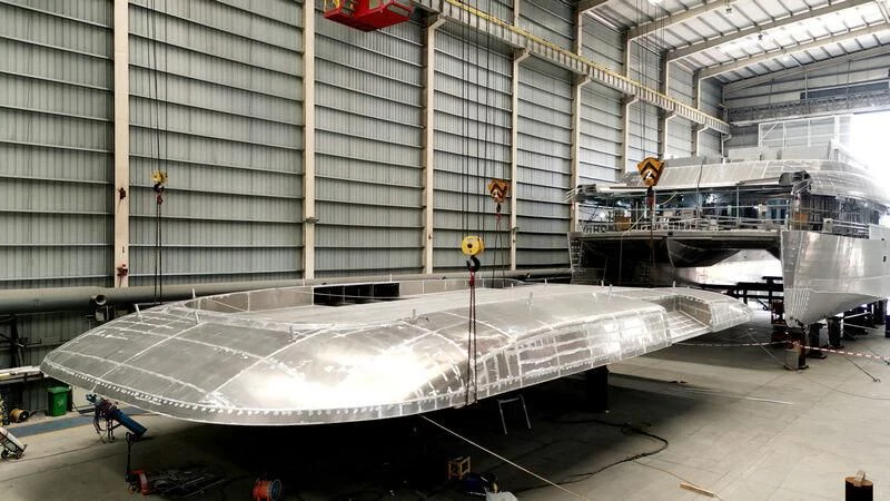 a large ship in a building aboard SILVERCAT Yacht for Sale