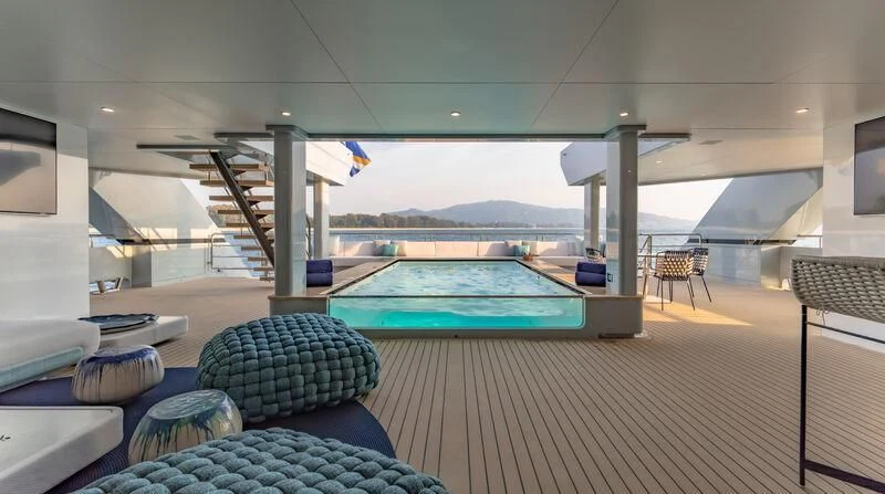 a pool table in a room aboard SILVERCAT Yacht for Sale
