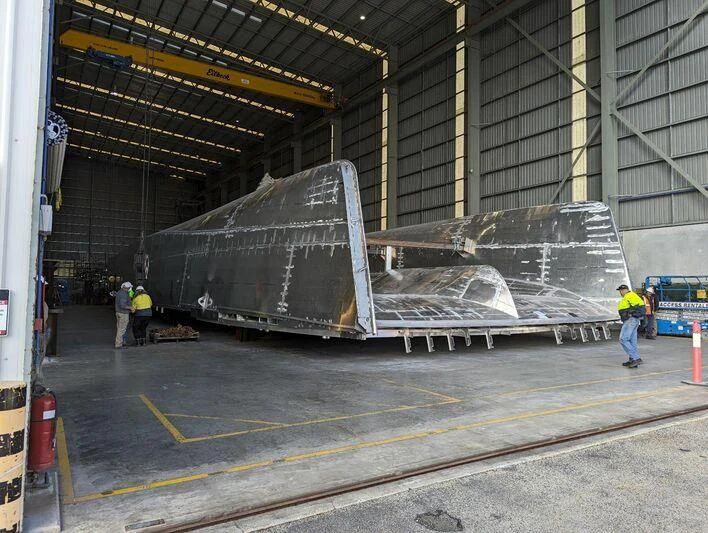 a large metal object in a warehouse aboard SILVERCAT Yacht for Sale