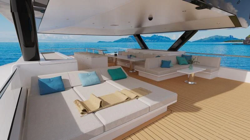 a room with a bed and a table and chairs aboard SILVERCAT Yacht for Sale