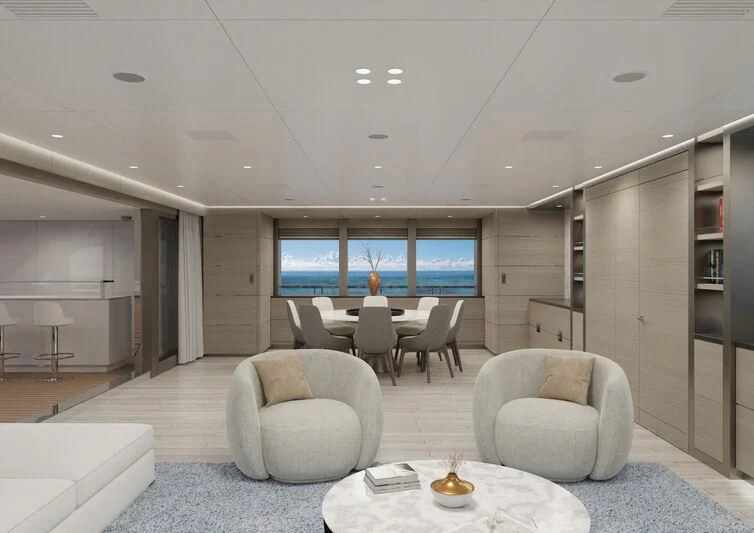 a room with a table chairs and a tv aboard SILVERCAT Yacht for Sale