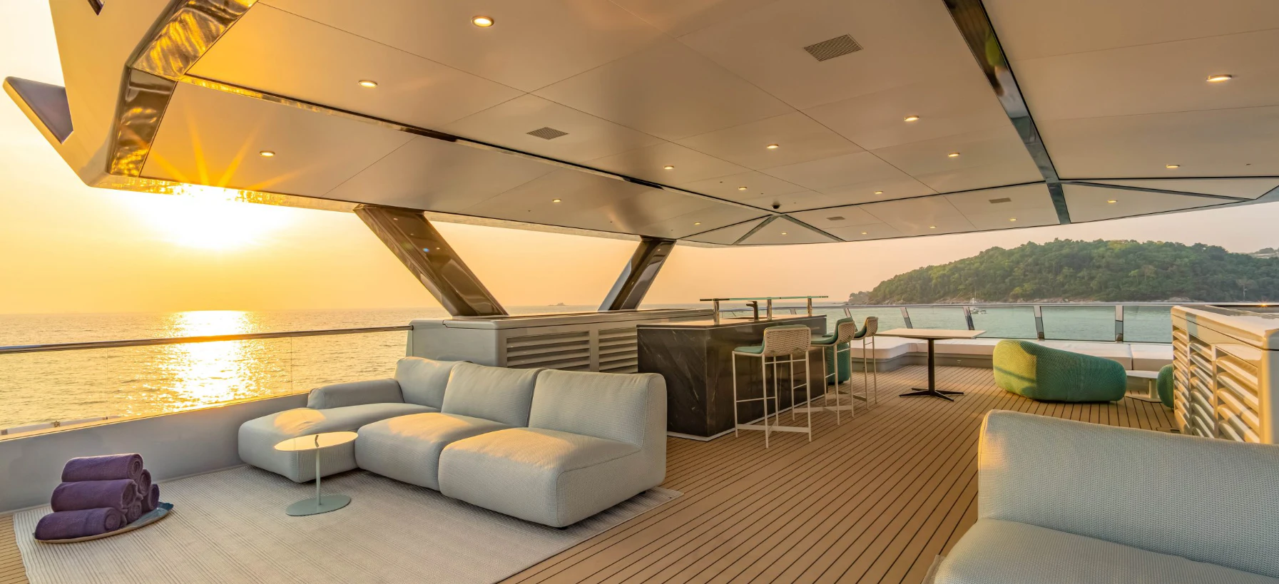 a large living room with a large balcony aboard SILVERCAT Yacht for Sale
