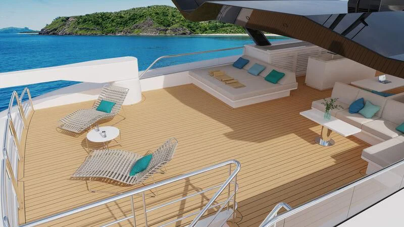 a deck with a pool and lounge chairs aboard SILVERCAT Yacht for Sale