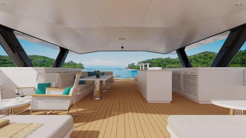 a room with a wood floor and a large window with a view of the ocean aboard SILVERCAT Yacht for Sale