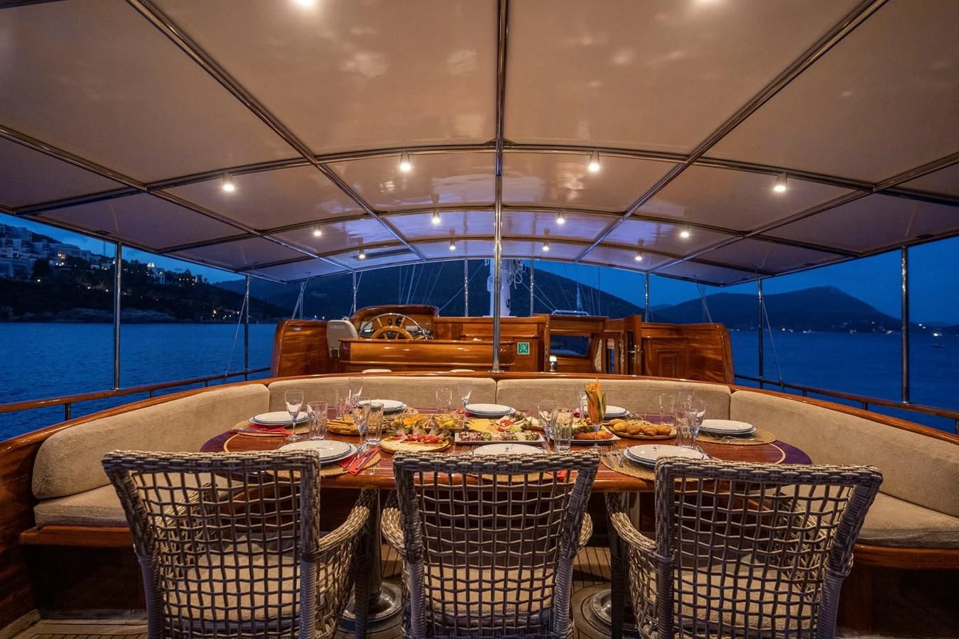 a table set for dinner aboard L'ORIENT Yacht for Sale