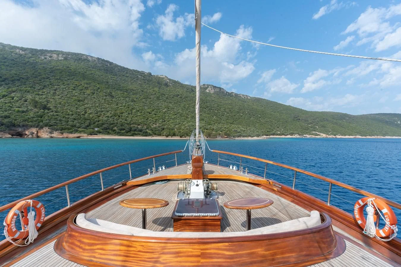 a boat on a body of water aboard L'ORIENT Yacht for Sale