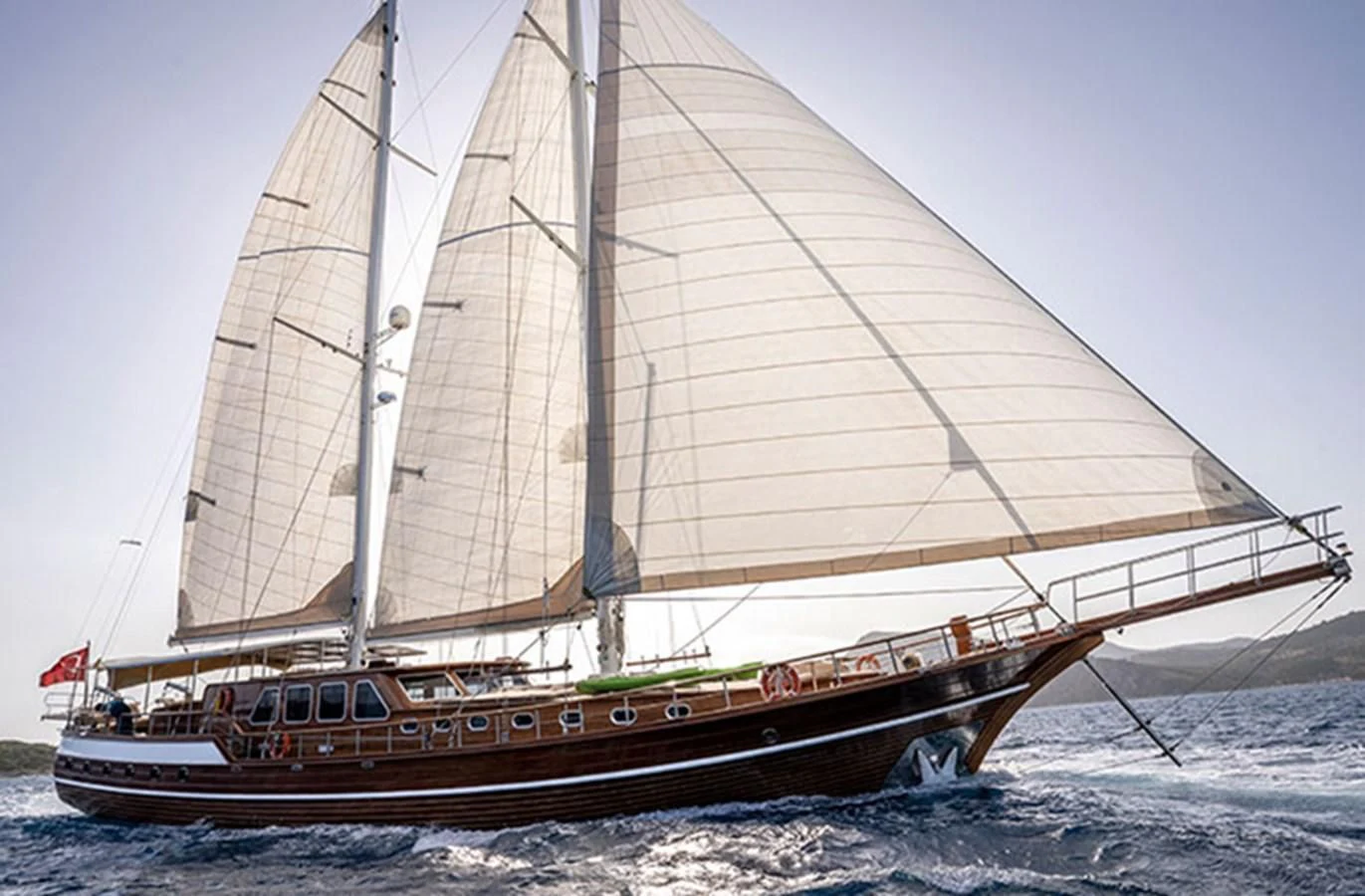 a boat on the water aboard L'ORIENT Yacht for Sale