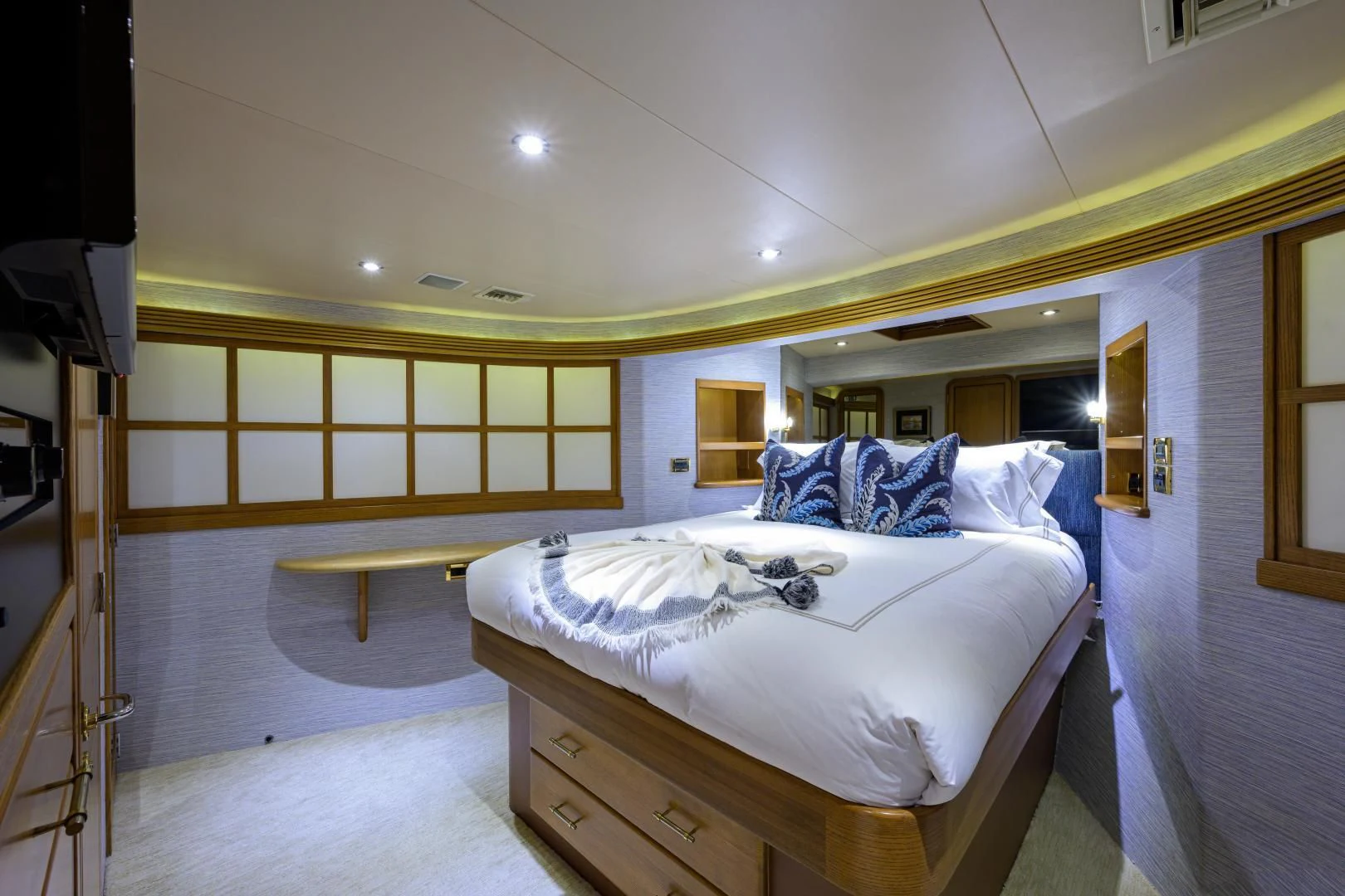 a couple of beds in a room aboard SUPERSTAR Yacht for Charter