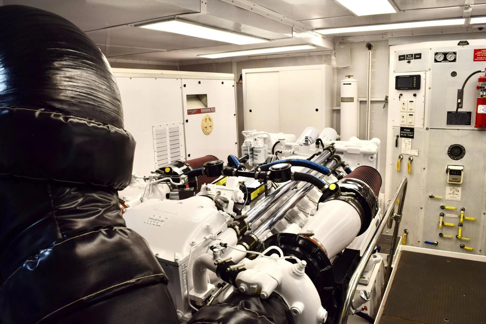 a person working on a machine aboard SUPERSTAR Yacht for Charter