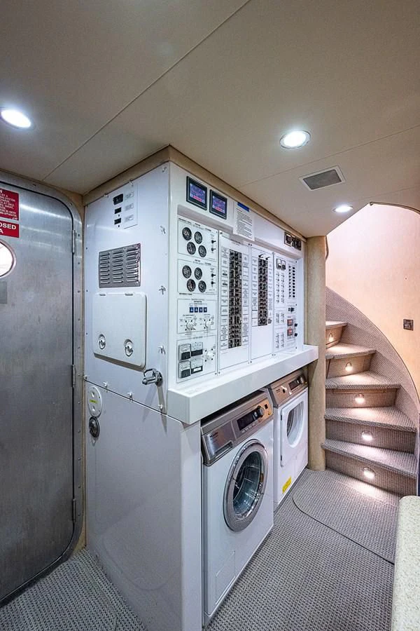 a machine in a room aboard SUPERSTAR Yacht for Charter