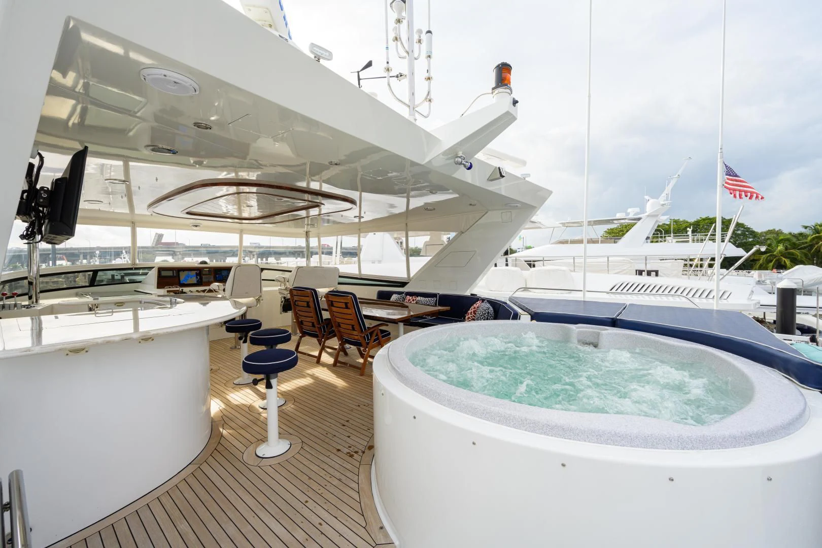 a large white pool on a deck aboard SUPERSTAR Yacht for Charter