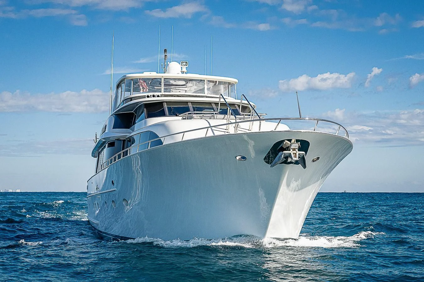 a large white boat in the water aboard SUPERSTAR Yacht for Charter