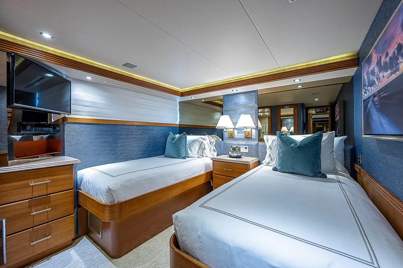 a room with two beds aboard SUPERSTAR Yacht for Charter