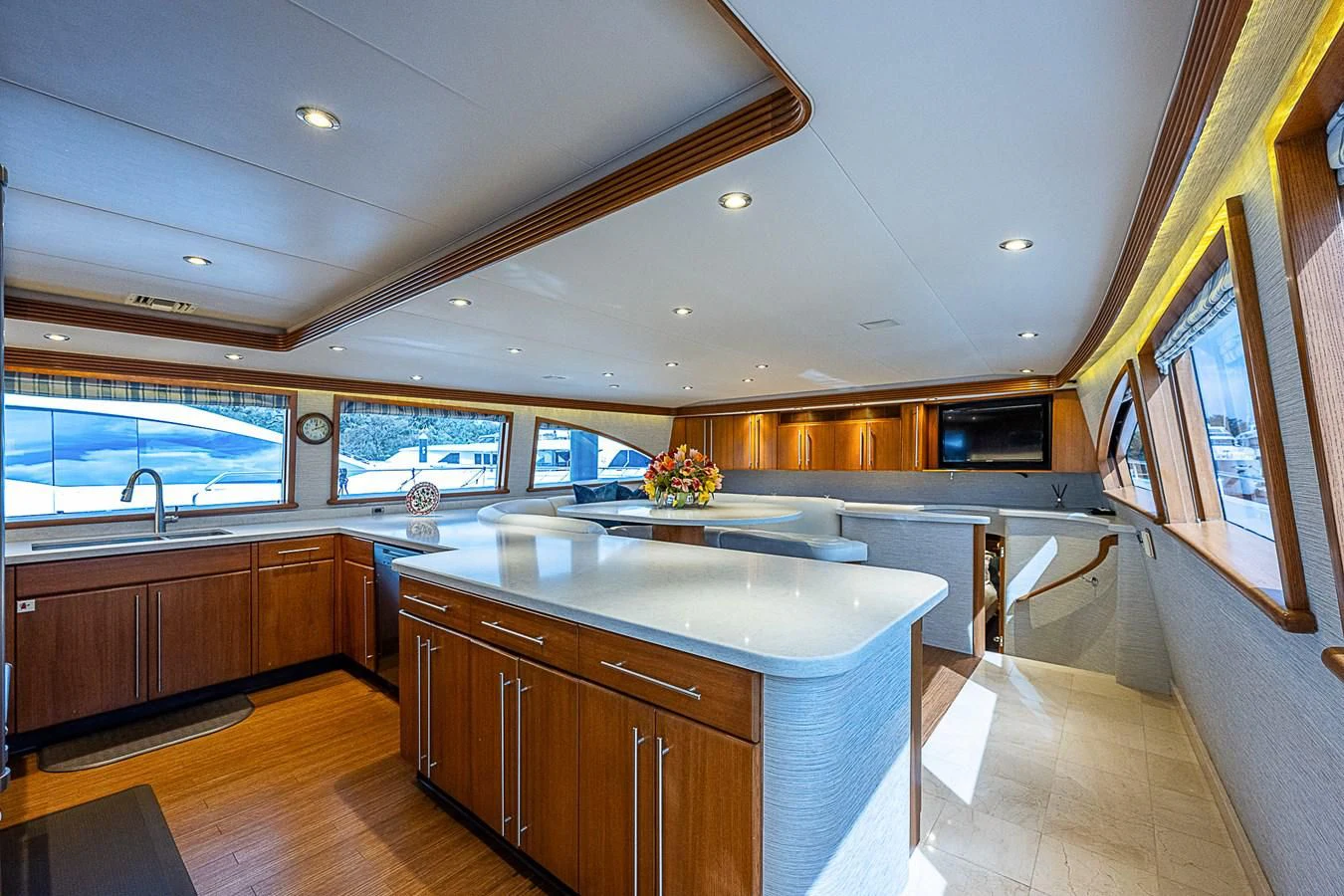 a kitchen with wooden cabinets aboard SUPERSTAR Yacht for Charter