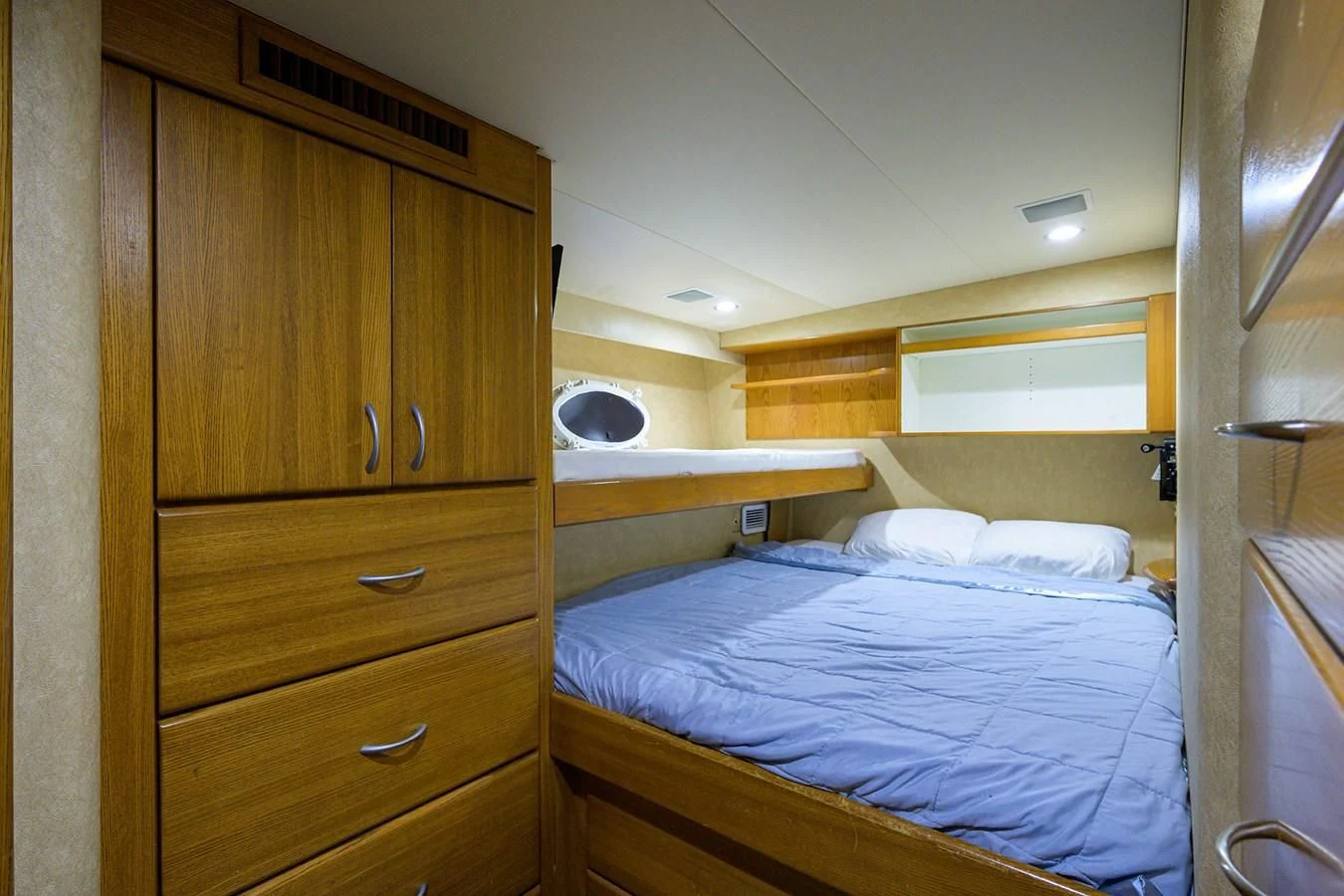 a room with wooden cabinets aboard SUPERSTAR Yacht for Charter