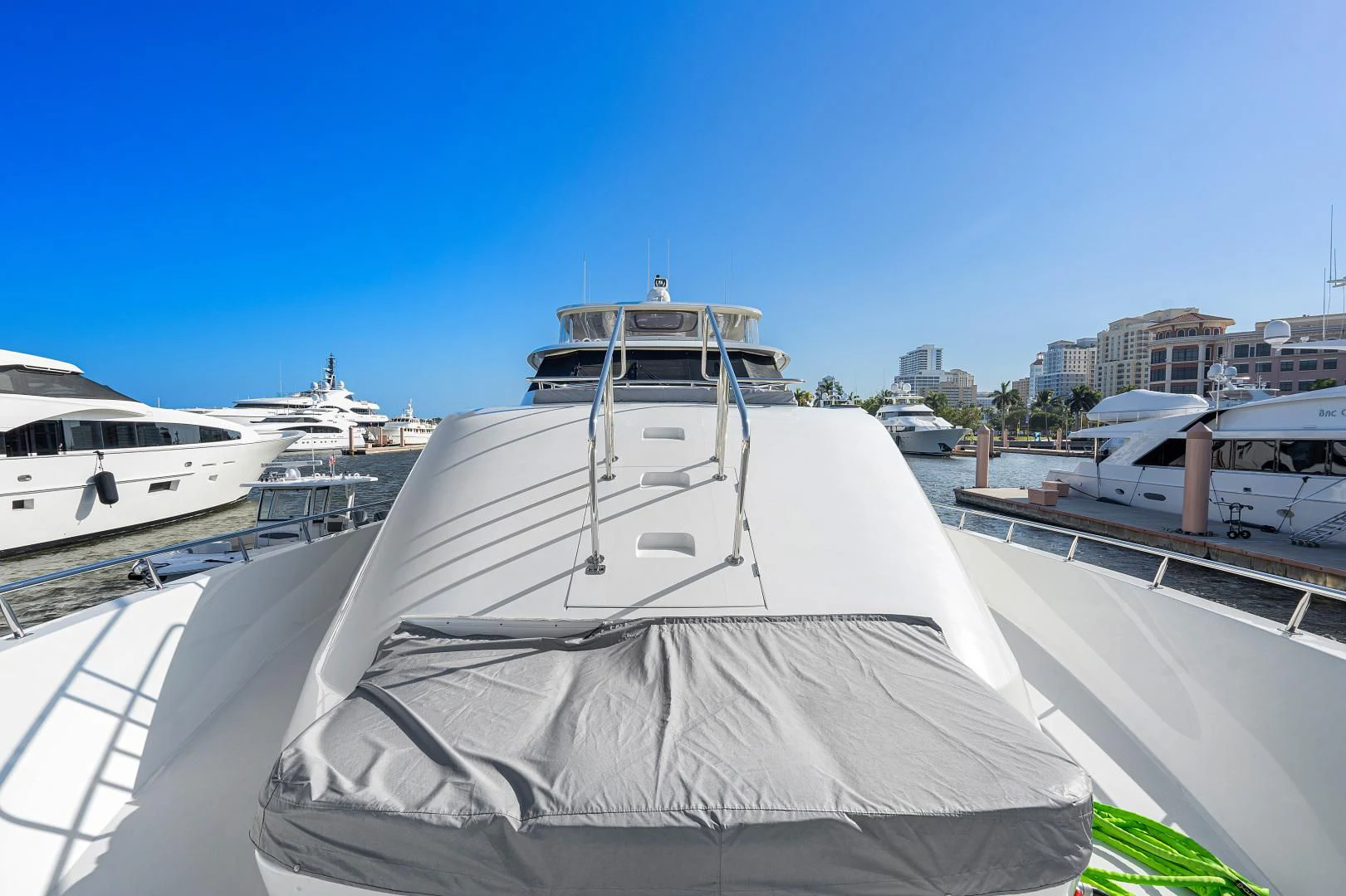 a boat docked at a pier aboard SUPERSTAR Yacht for Charter