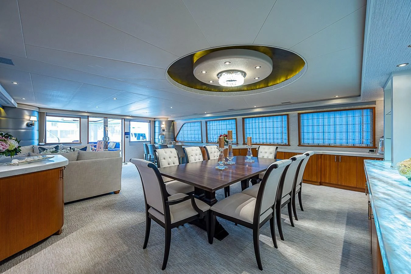 a dining room with a table and chairs aboard SUPERSTAR Yacht for Charter