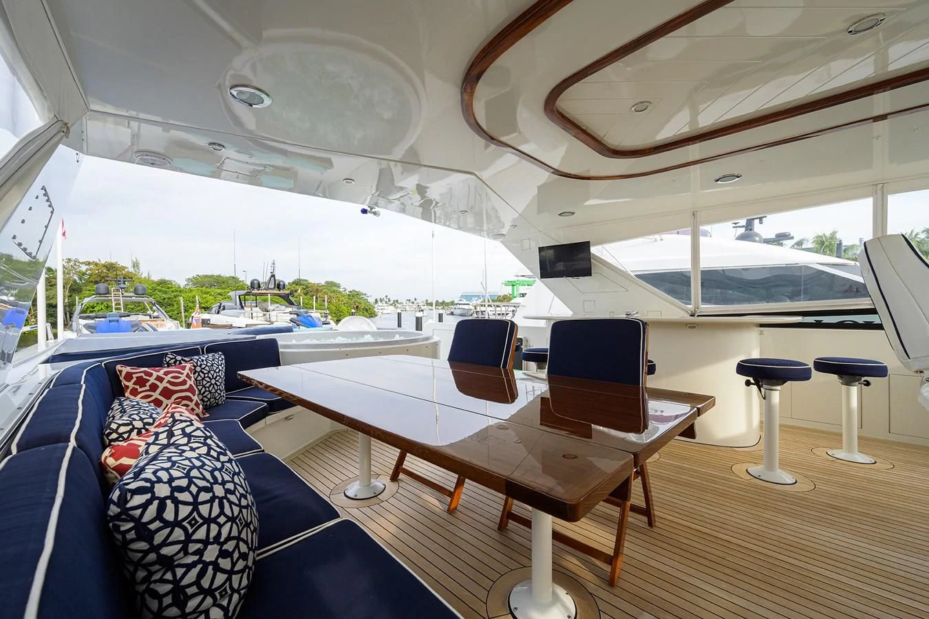 a room with a table chairs and a large window aboard SUPERSTAR Yacht for Charter