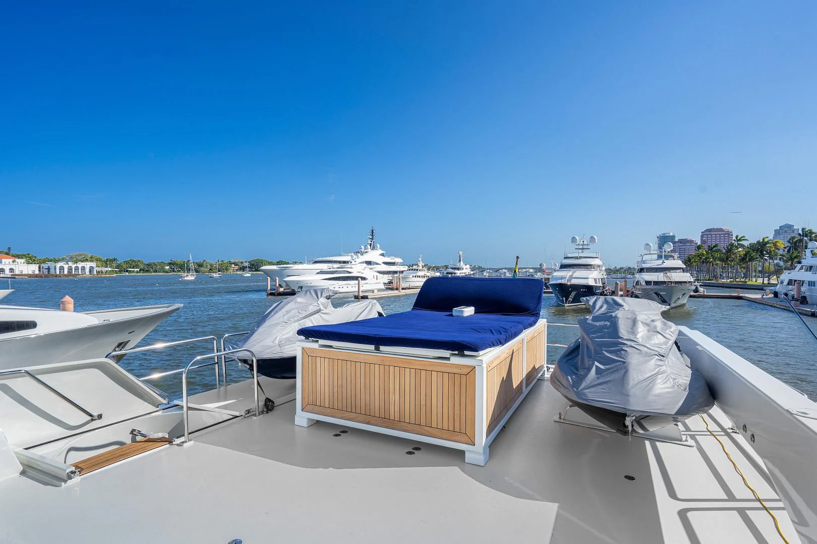 a boat docked at a pier aboard SUPERSTAR Yacht for Charter