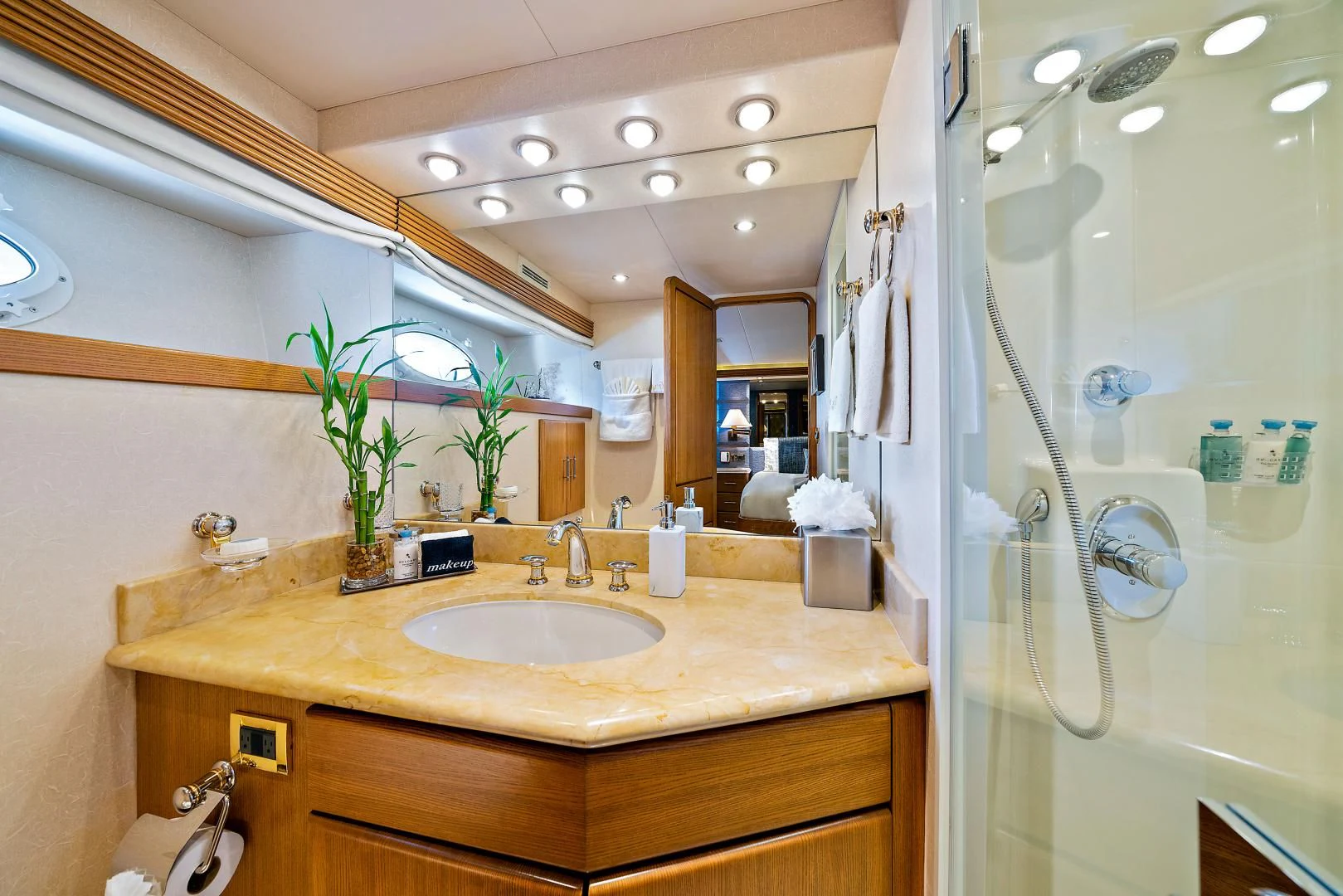 a bathroom with a sink and a shower aboard SUPERSTAR Yacht for Charter