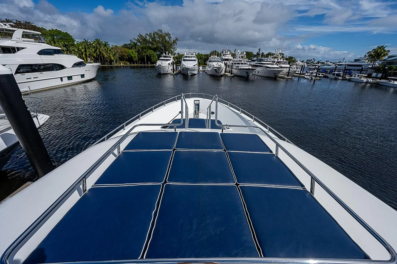a large ship in a harbor aboard SUPERSTAR Yacht for Charter