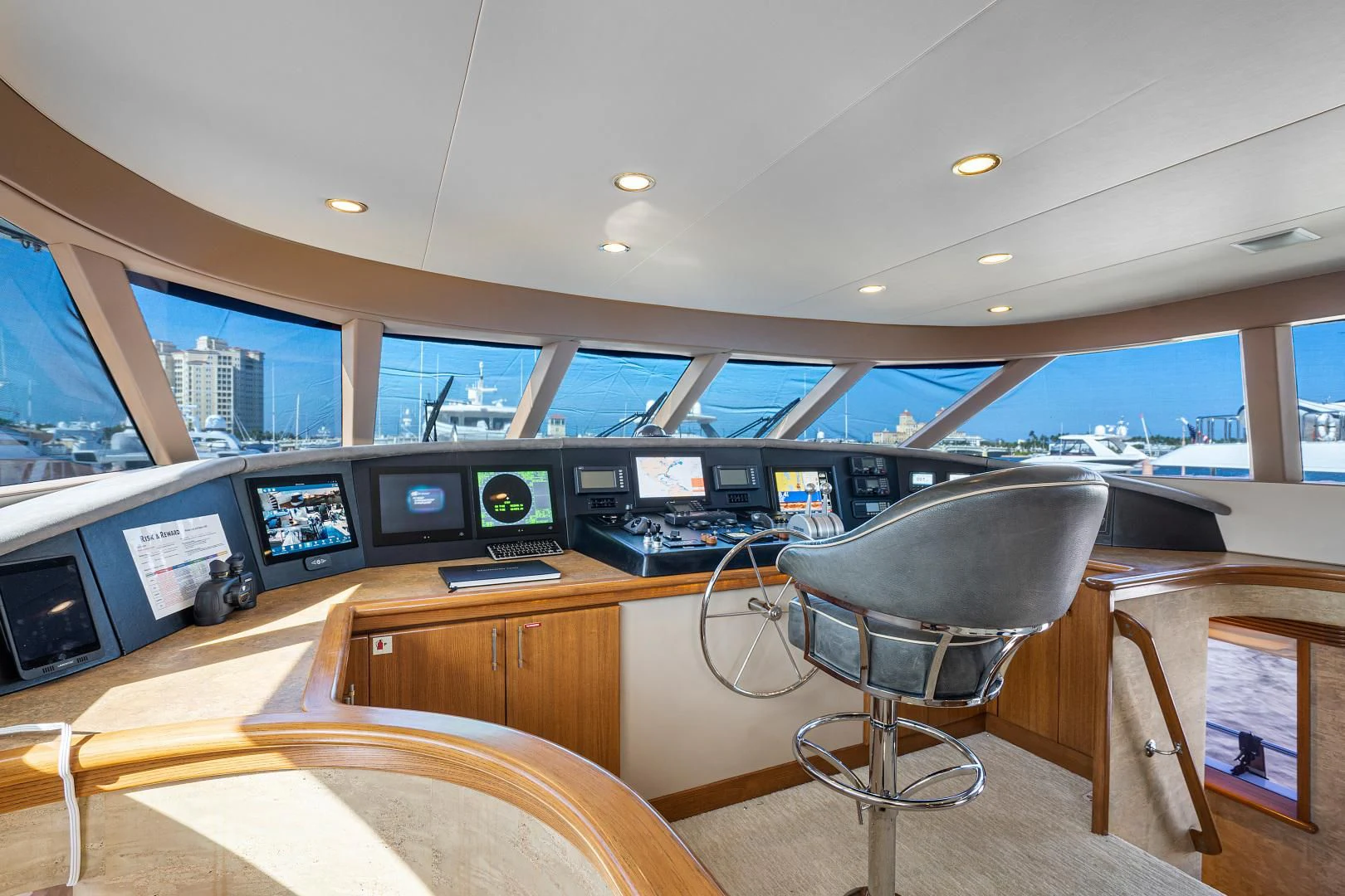 a room with a desk and chairs aboard SUPERSTAR Yacht for Charter