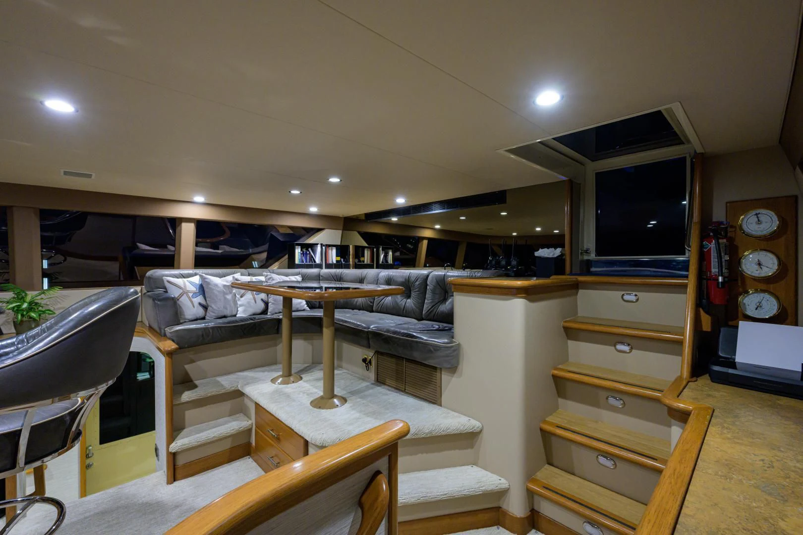 a room with a bed and a tv aboard SUPERSTAR Yacht for Charter